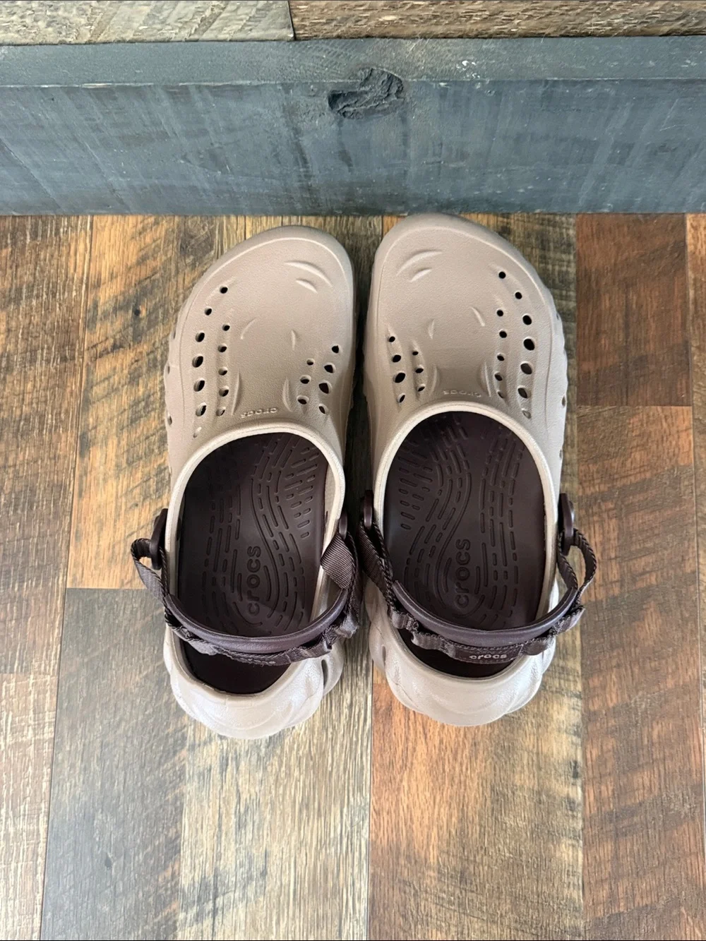 CROCS Slip-On Clogs in Taupe with Dark Brown Strap. Run a little big.